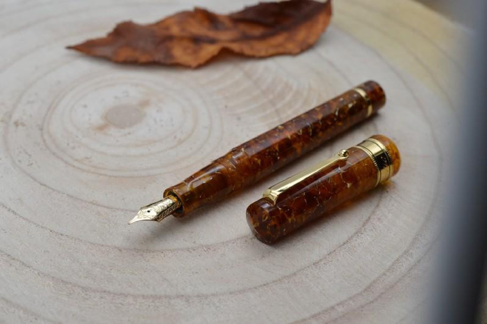 Santini Italia Libra Ambra GP 14k Superflexy Fine nib piston filler pen with ebonite feeder