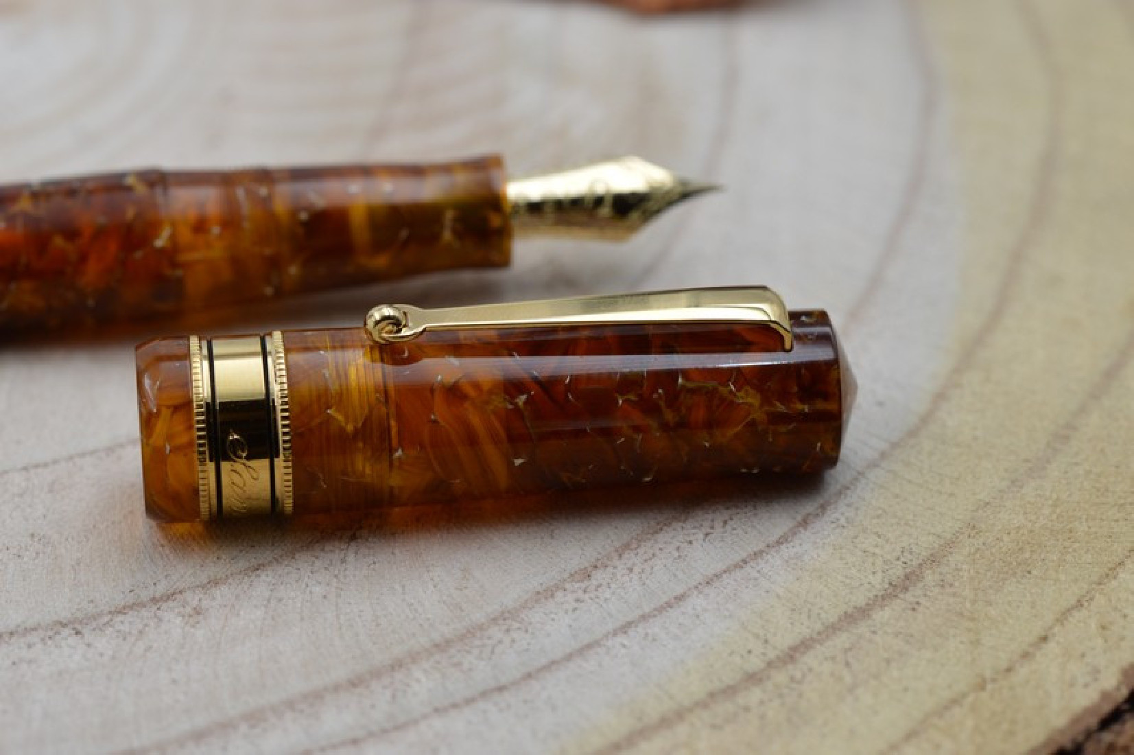 Santini Italia Libra Ambra GP 14k Superflexy Fine nib piston filler pen with ebonite feeder