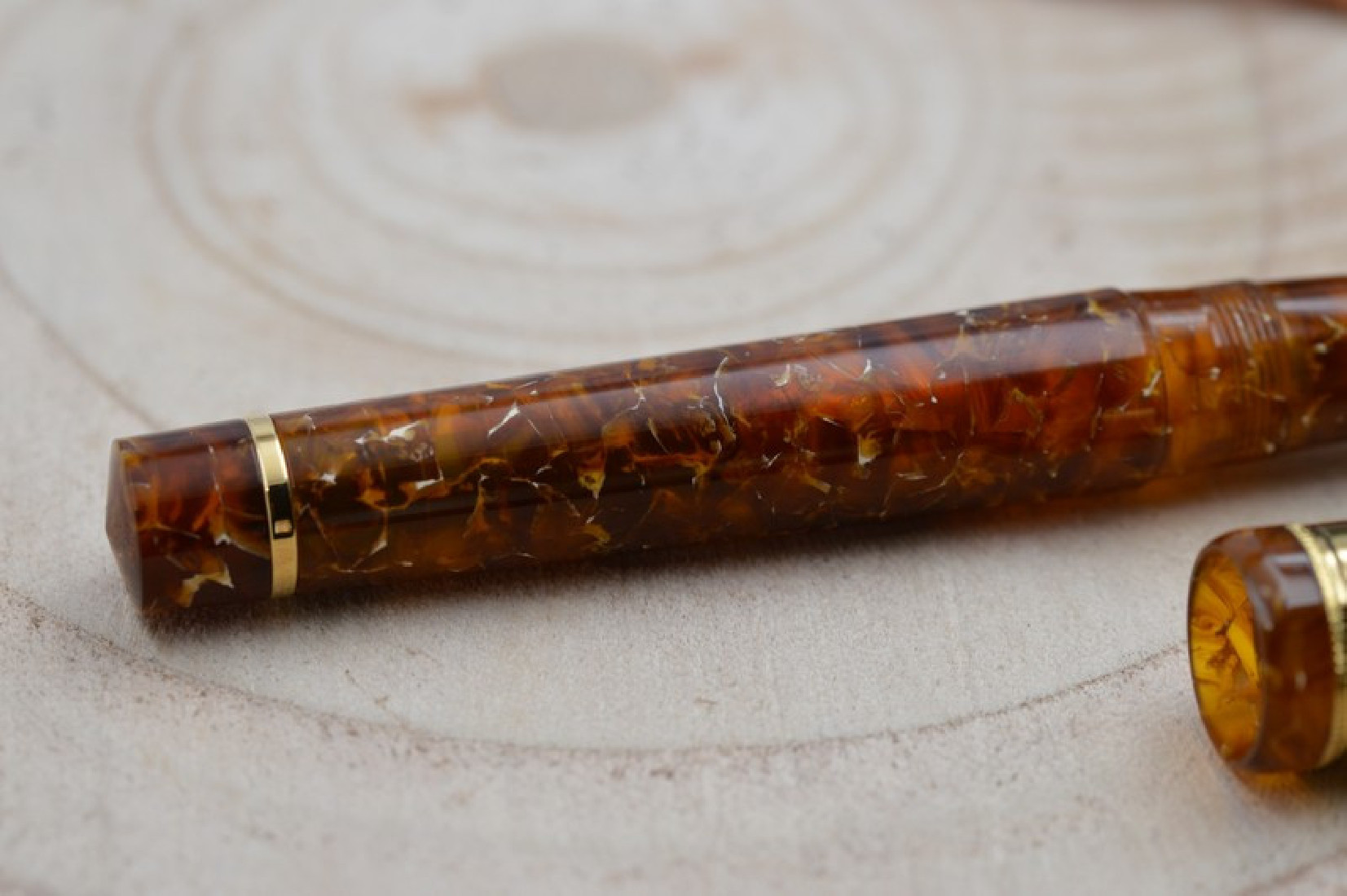 Santini Italia Libra Ambra GP 14k Superflexy Fine nib piston filler pen with ebonite feeder