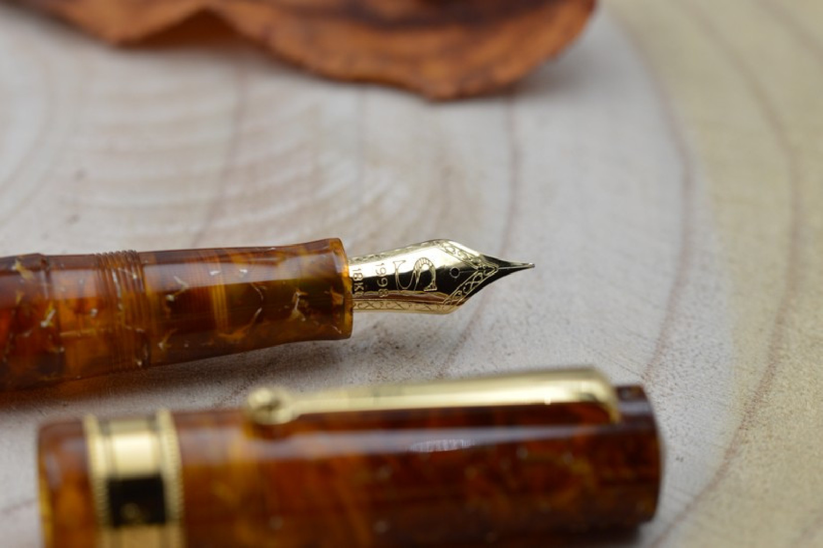 Santini Italia Libra Ambra GP 14k Superflexy Fine nib piston filler pen with ebonite feeder