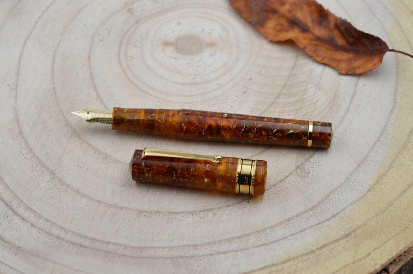 Santini Italia Libra Ambra GP 14k Superflexy Fine nib piston filler pen with ebonite feeder