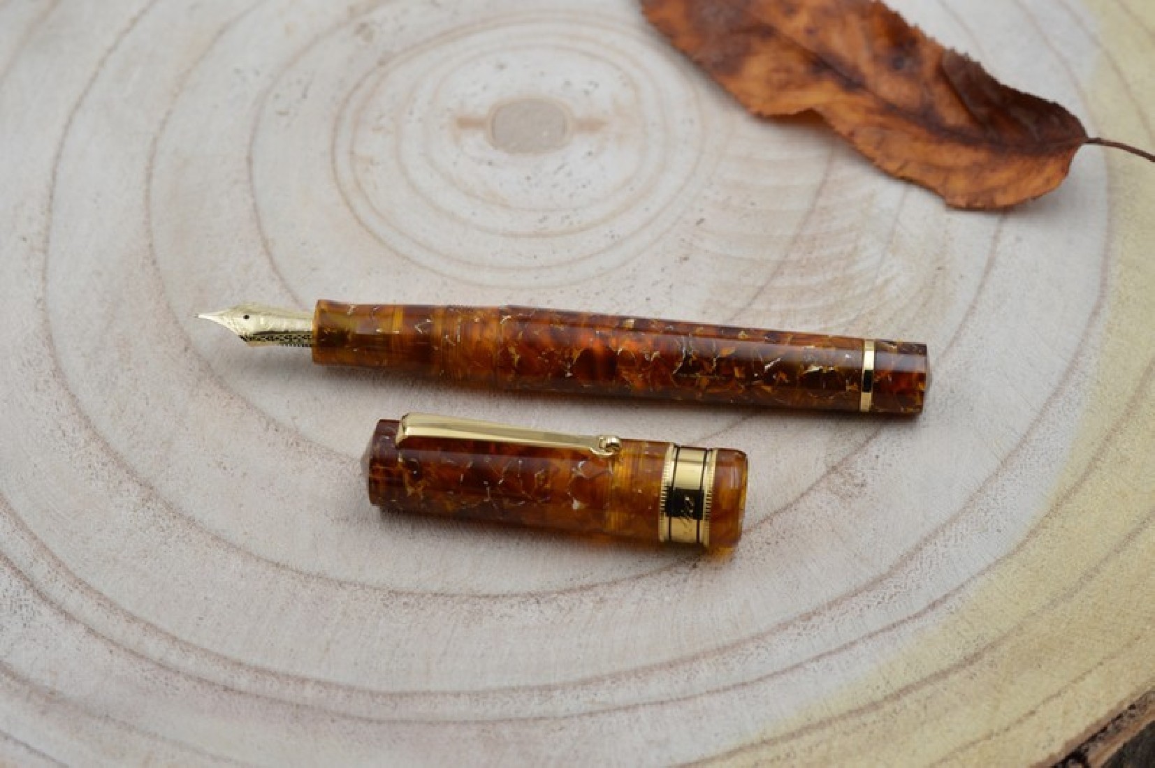 Santini Italia Libra Ambra GP 14k Superflexy Fine nib piston filler pen with ebonite feeder