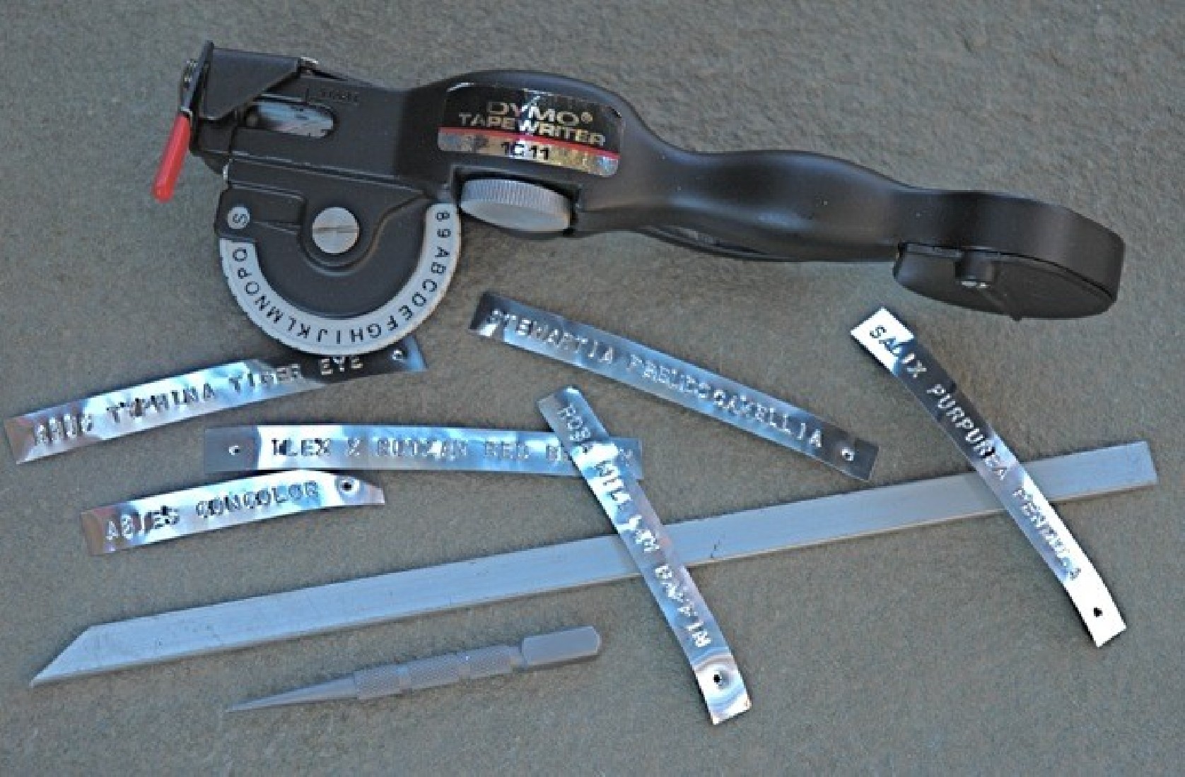 Dymo Rhino M1011 Embossing Label Maker with Case.